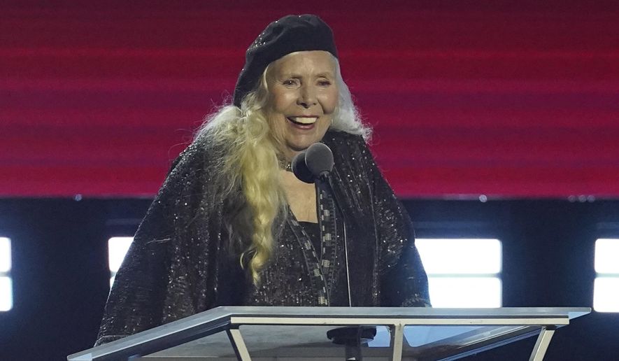 Joni Mitchell accepts the Person of the Year award at the 31st annual MusiCares benefit gala on Friday, April 1, 2022, at the MGM Grand Conference Center in Las Vegas. (AP Photo/Chris Pizzello)