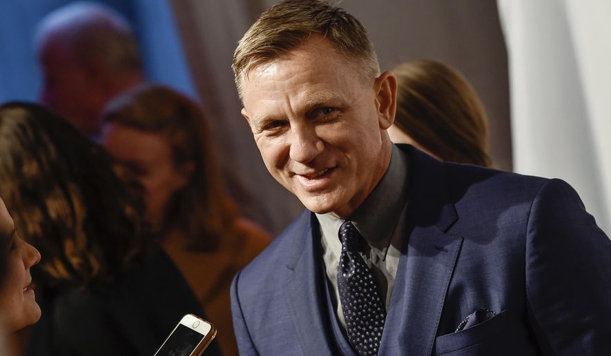 Actor Daniel Craig attends The Opportunity Network's 11th Annual Night of Opportunity Gala at Cipriani Wall Street, Monday, April 9, 2018 in New York. Could it be the curse of the Scottish play? Daniel Craig’s return to Broadway in a new version of “Macbeth” has been temporarily halted after the actor contracted COVID-19. (Photo by Evan Agostini/Invision/AP, File)