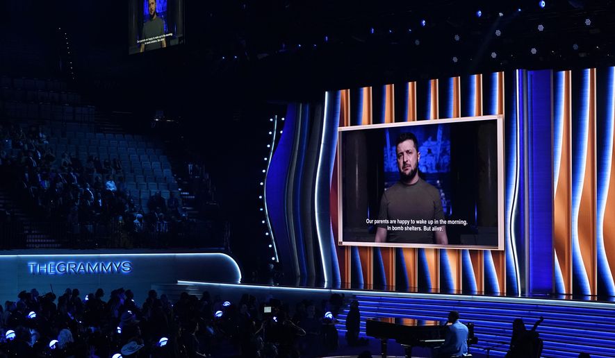 President of Ukraine, Volodymyr Zelenskyy, speaks on screen at the 64th Annual Grammy Awards on Sunday, April 3, 2022, in Las Vegas. (AP Photo/Chris Pizzello)