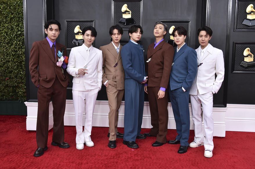 BTS arrives at the 64th Annual Grammy Awards at the MGM Grand Garden Arena on Sunday, April 3, 2022, in Las Vegas. (Photo by Jordan Strauss/Invision/AP) ** FILE **