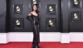 Olivia Rodrigo arrives at the 64th Annual Grammy Awards at the MGM Grand Garden Arena on Sunday, April 3, 2022, in Las Vegas. (Photo by Jordan Strauss/Invision/AP)