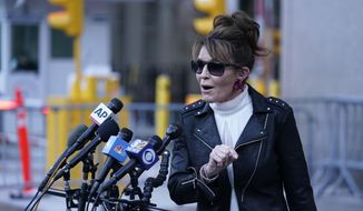 Former Alaska Gov. Sarah Palin speaks briefly to reporters as she leaves a courthouse in New York, Monday, Feb. 14, 2022. (AP Photo/Seth Wenig)