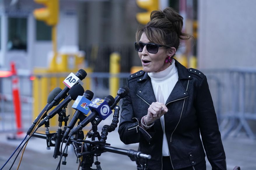 Former Alaska Gov. Sarah Palin speaks briefly to reporters as she leaves a courthouse in New York, Monday, Feb. 14, 2022. (AP Photo/Seth Wenig)