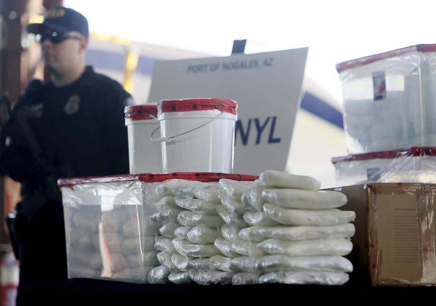 A display of the fentanyl and meth that was seized by Customs and Border Protection officers at the Nogales Port of Entry is shown during a press conference Thursday, Jan. 31, 2019, in Nogales, Ariz. (Mamta Popat/Arizona Daily Star via AP, File)