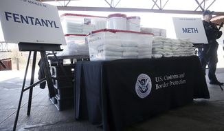 A display of the fentanyl and meth that was seized by Customs and Border Protection officers over the weekend at the Nogales Port of Entry is shown during a press conference on Thursday, Jan. 31, 2019, in Nogales, Ariz. As the number of U.S. overdose deaths continues to soar, states are trying to take steps to combat a flood of the drug that has proved the most lethal -- illicitly produced fentanyl. (Mamta Popat/Arizona Daily Star via AP, File)