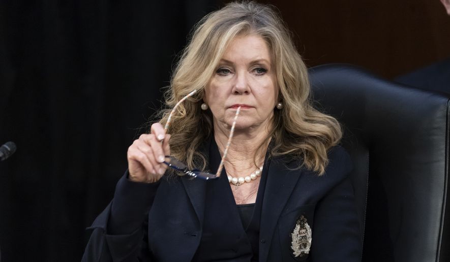 Sen. Marsha Blackburn, R-Tenn., listens as the Senate Judiciary Committee begins debate on Ketanji Brown Jackson&#39;s nomination for the Supreme Court, on Capitol Hill in Washington, Monday, April 4, 2022. Democrats are aiming to confirm her by the end of the week as the first Black woman on the court but Republicans are likely to try to drag out the process. (AP Photo/J. Scott Applewhite)