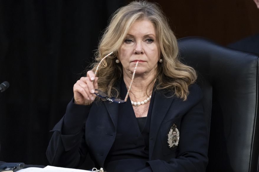 Sen. Marsha Blackburn, R-Tenn., listens as the Senate Judiciary Committee begins debate on Ketanji Brown Jackson&#x27;s nomination for the Supreme Court, on Capitol Hill in Washington, Monday, April 4, 2022. Democrats are aiming to confirm her by the end of the week as the first Black woman on the court but Republicans are likely to try to drag out the process. (AP Photo/J. Scott Applewhite)
