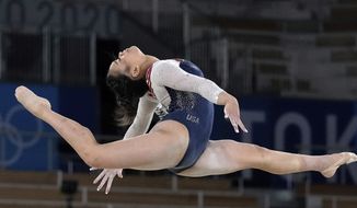Sunisa Lee, of the United States, performs on the floor during the artistic gymnastics women&#39;s all-around final at the 2020 Summer Olympics, Thursday, July 29, 2021, in Tokyo. The 19-year-old Auburn freshman has helped lead Auburn to the NCAA gymnastics championships April 14-16 in Fort Worth, Texas. Lee has also parlayed her all-around gold into a run on Dancing with the Stars since the new name, image and likeness rules made college an easy decision. (AP Photo/Gregory Bull, File) **FILE**