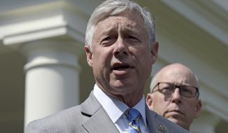 Rep. Fred Upton, R-Mich., left, speaks to reporters outside the White House in Washington, May 3, 2017. Upton, who voted to impeach President Donald Trump over the Capitol insurrection, announced Tuesday, April 5, 2022, that he&#39;s retiring after 35 years in office. (AP Photo/Susan Walsh, File)