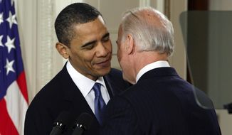 Then-Vice President Joe Biden whispers &amp;quot;This is a big f---ing deal,&amp;quot; to President Barack Obama after introducing Obama during the health care bill ceremony in the East Room of the White House in Washington, March 23, 2010. Obama returns to the White House on Tuesday, April 5, 2022, for a moment he can savor: His signature Affordable Care Act is now part of the fabric of the American health care system and President Joe Biden is looking to extend its reach. (AP Photo/J. Scott Applewhite, File)
