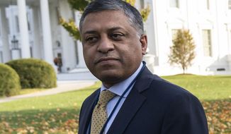 Dr. Rahul Gupta, the director of the White House Office of National Drug Control Policy, is shown at the White House, Thursday, Nov. 18, 2021, in Washington. Gupta was one of the first witnesses whose video deposition was played at a bench trial Tuesday, April 5, 2022, in which several pharmaceutical manufacturers are accused in a lawsuit of contributing to the crisis. He testified that the opioid epidemic got so bad in drug-ravaged West Virginia that the state was having trouble finding foster parents to care of children. (AP Photo/Alex Brandon, File)