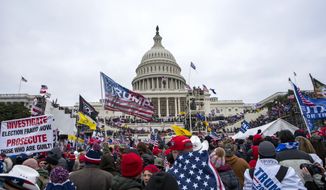 FILE - Rioters loyal to President Donald Trump rally at the U.S. Capitol in Washington on Jan. 6, 2021. A federal judge is set to deliver a verdict in the trial of a New Mexico man who claims a police officer waved him into the U.S. Capitol building after a riot erupted on Jan. 6, 2021. U.S. District Judge Trevor McFadden didn&#x27;t immediately rule on Wednesday after hearing attorneys&#x27; closing arguments in the trial of Matthew Martin. McFadden heard testimony without a jury after Martin’s trial started on Tuesday. He is expected to announce a verdict on Wednesday afternoon.  (AP Photo/Jose Luis Magana, File)