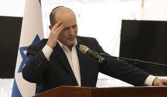 Israeli Prime Minister Naftali Bennett speaks at a press conference on an Israeli Defense Force base in Beit El in the West Bank, Tuesday, April 5, 2022. (AP Photo/Maya Alleruzzo)