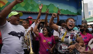 Demonstrators shout &amp;quot;Free Alex Saab,&amp;quot; as they demand the release of Colombian businessman Alex Saab who has been extradited to the U.S., during a protest in the Petare neighborhood of Caracas, Venezuela, Monday, April 4, 2022. Saab, a close ally of Venezuela&#39;s President Nicolas Maduro, who prosecutors in the U.S. believe could be the most significant witness ever about corruption in the South American country, was extradited from Cabo Verde and is now in U.S. custody. (AP Photo/Ariana Cubillos)