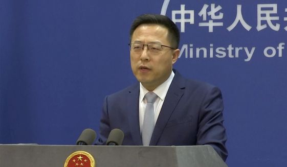 In an image taken from video, Chinese Foreign Ministry spokesperson Zhao Lijian speaks during a media briefing Thursday, March 10, 2022, in Beijing. (AP Photo, File)