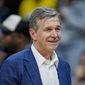 North Carolina Gov. Roy Cooper leaves the court following an NBA basketball game between the Charlotte Hornets and Orlando Magic on Thursday, April 7, 2022, in Charlotte, N.C. (AP Photo/Rusty Jones) ** FILE **
