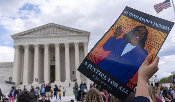 People celebrate the confirmation of Judge Ketanji Brown Jackson the first Black woman to reach the Supreme Court during a rally outside of the U.S. Supreme Court on Capitol Hill, in Washington, Friday, April 8, 2022. ( AP Photo/Jose Luis Magana)