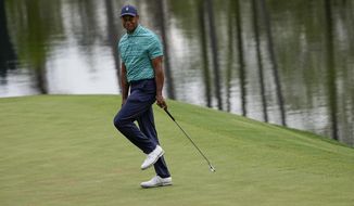 Tiger Woods reacts to a missed birdie putt on the 16th hole during the second round at the Masters golf tournament on Friday, April 8, 2022, in Augusta, Ga. (AP Photo/David J. Phillip)