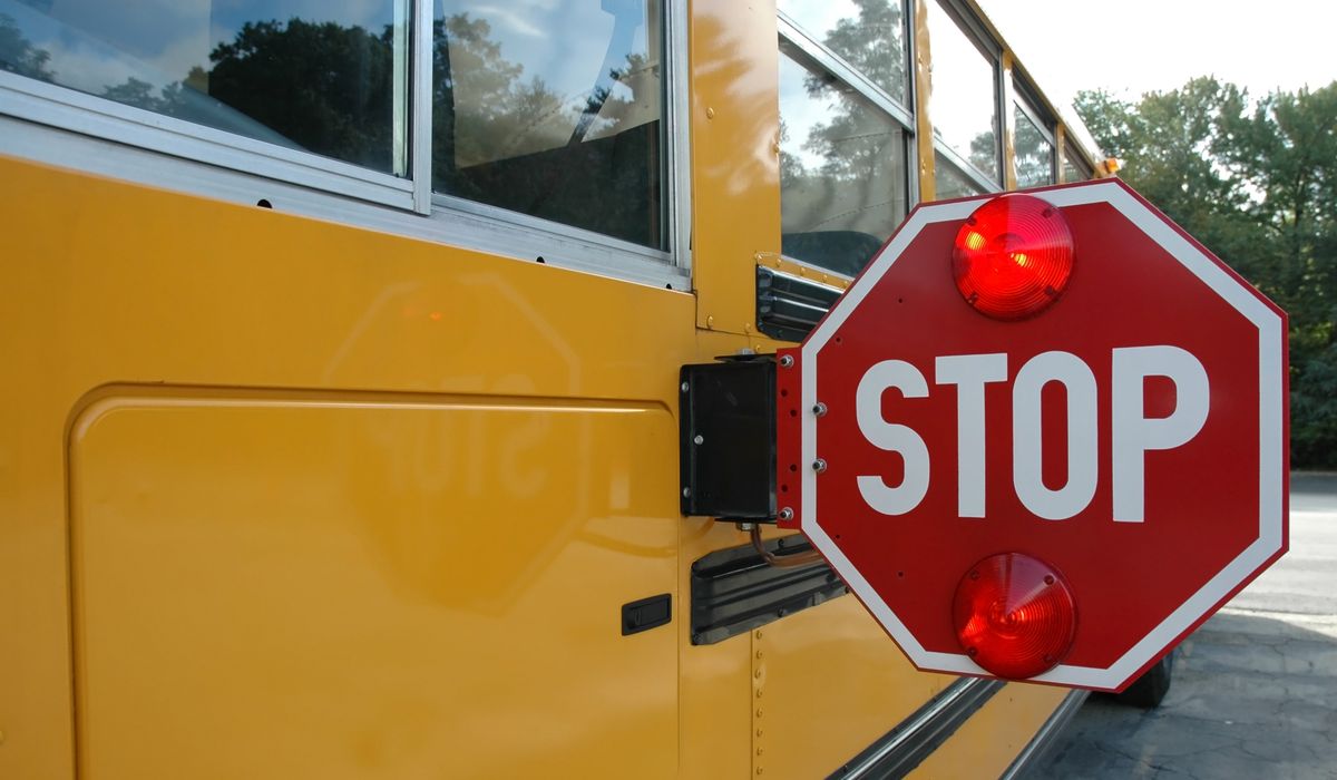 NextImg:Trio of masked assailants sought after rushing onto school bus, aiming to shoot student