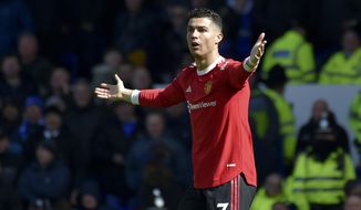 Manchester United&#39;s Cristiano Ronaldo gestures to the linesman during the Premier League soccer match between Everton and Manchester United at Goodison Park, in Liverpool, England, Saturday, April 9, 2022. (AP Photo/Rui Vieira)