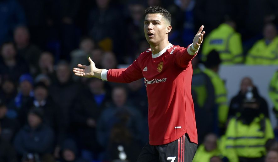 Manchester United&#39;s Cristiano Ronaldo gestures to the linesman during the Premier League soccer match between Everton and Manchester United at Goodison Park, in Liverpool, England, Saturday, April 9, 2022. (AP Photo/Rui Vieira)