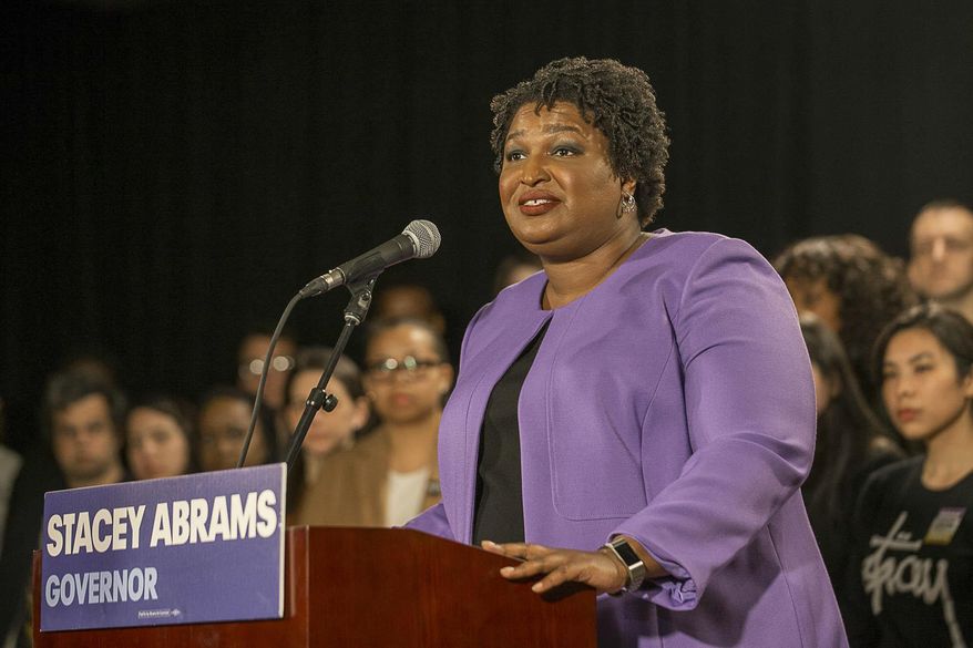 Georgia gubernatorial candidate Stacey Abrams makes remarks during a press conference at the Abrams Headquarters in Atlanta, on Nov. 16, 2018. (Alyssa Pointer/Atlanta Journal-Constitution via AP, File)