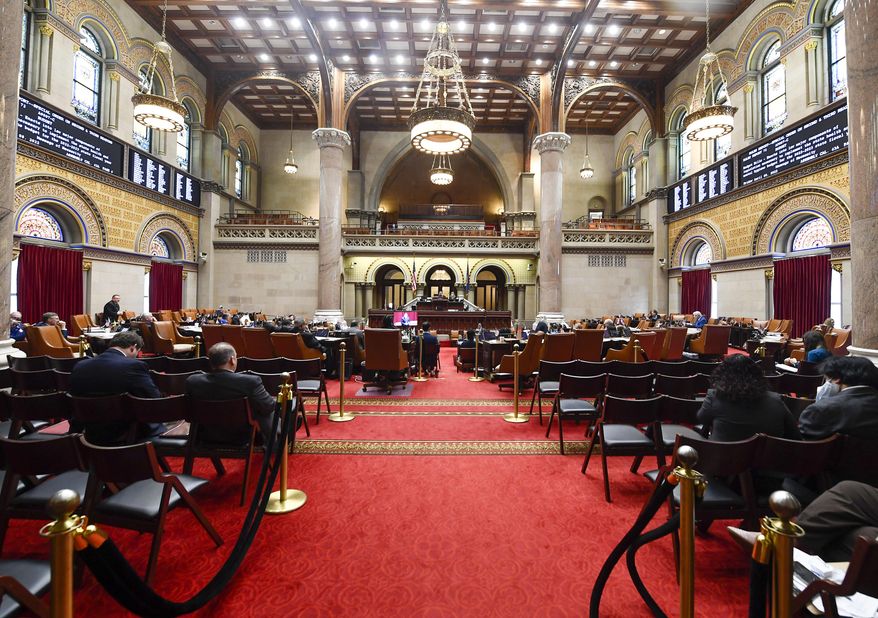 The Assembly Chamber is pictured during a legislative session at the state Capitol Friday, April 8, 2022, in Albany, N.Y. (AP Photo/Hans Pennink)