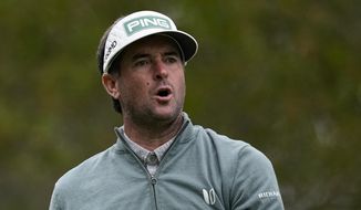 Bubba Watson reacts to his tee shot on the fourth hole during the third round at the Masters golf tournament on Saturday, April 9, 2022, in Augusta, Ga. (AP Photo/Robert F. Bukaty)
