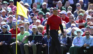 Tiger Woods prepares to putt on the second green during the final round of the Masters golf tournament, Sunday, April 10, 2022, in Augusta, Ga. (Curtis Compton/Atlanta Journal-Constitution via AP) ** FILE **