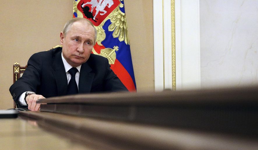 Russian President Vladimir Putin chairs a meeting with members of the government via teleconference in Moscow, on March 10, 2022. (Mikhail Klimentyev, Sputnik, Kremlin Pool Photo via AP, File)