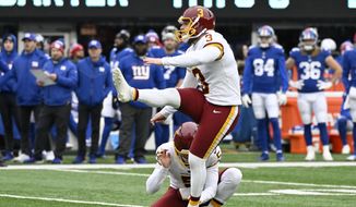 Washington kicker Joey Slye (3) kicks a field goal against the New York Giants during the second quarter of an NFL football game, Sunday, Jan. 9, 2022, in East Rutherford, N.J. The Washington Commanders have re-signed kicker Joey Slye to a two-year deal that could be worth up to $5 million with $2 million guaranteed, according to a person with knowledge of the move. The person spoke to The Associated Press on condition of anonymity Monday, April 11, 2022, because the deal had not been announced. Slye had previously been tendered a $2.4 million qualifying offer as a restricted free agent .(AP Photo/Bill Kostroun, File) **FILE**