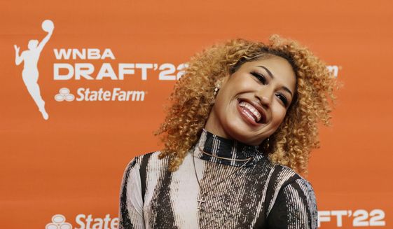 Mississippi&#39;s Shakira Austin poses for a picture before the WNBA basketball draft, Monday, April 11, 2022, in New York. (AP Photo/Adam Hunger) **FILE**