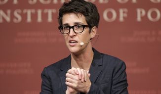 MSNBC television anchor Rachel Maddow, host of the Rachel Maddow Show, moderates the &quot;Perspectives on National Security&quot; panel on Oct. 16, 2017, in Cambridge, Mass. Maddow returned to the air on Monday, April 11, 2022, with some bad news for her fans: Starting in May, she will be doing her prime-time show just once a week. (AP Photo/Steven Senne, File)