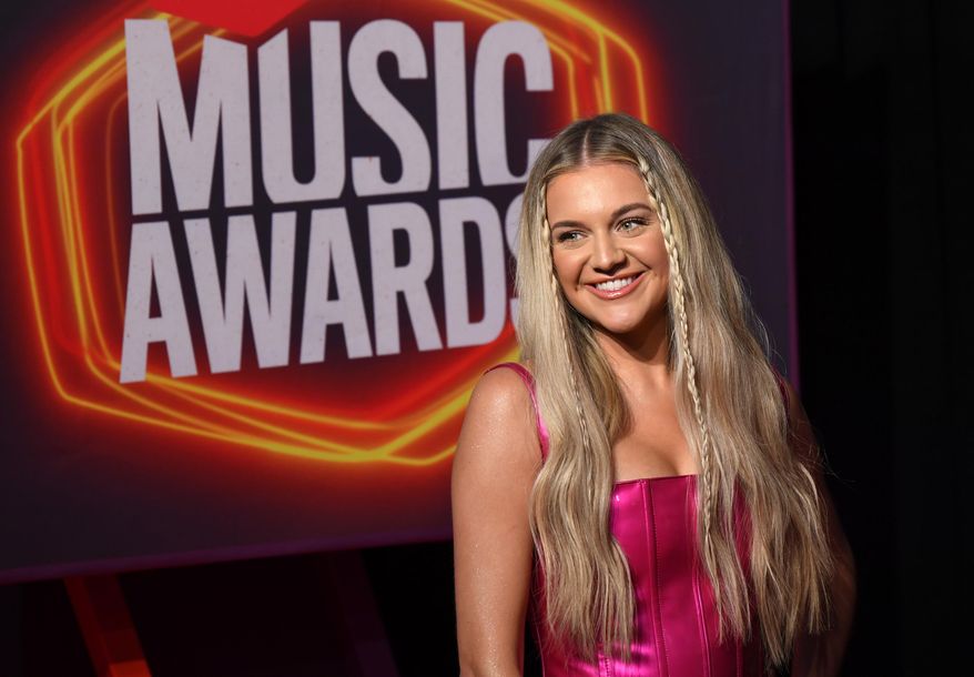 Kelsea Ballerini will be co-hosting the CMT Music Awards from home after she tested positive for COVID-19 days before the awards show. (AP Photo/John Amis, File)