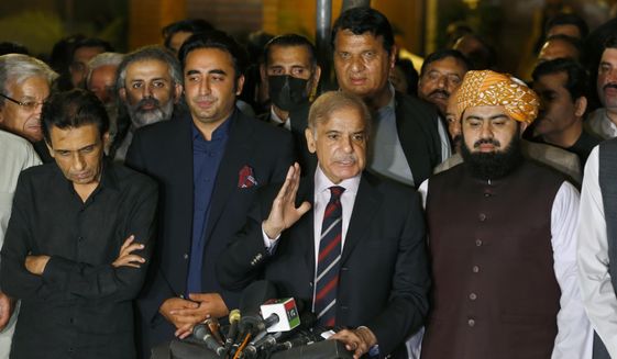 Pakistan&#39;s opposition leader Shahbaz Sharif, center, speaks while other opposition parties leader watch during a press conference after the Supreme Court decision, in Islamabad, Pakistan, Thursday, April 7, 2022. Pakistan&#39;s Supreme Court on Thursday blocked Prime Minister Imran Khan&#39;s bid to stay in power, ruling that his move to dissolve Parliament and call early elections was illegal. That set the stage for a no-confidence vote by opposition lawmakers, who say they have enough support to oust him. (AP Photo/Anjum Naveed)