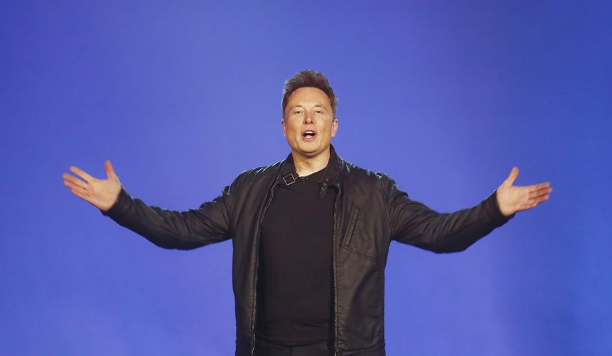 Tesla CEO Elon Musk introduces the Cybertruck at Tesla&#39;s design studio Thursday, Nov. 21, 2019, in Hawthorne, Calif. (AP Photo/Ringo H.W. Chiu, File)