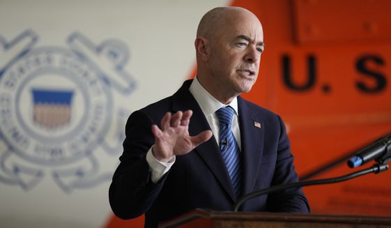 U.S. Homeland Security Secretary Alejandro Mayorkas speaks as he presents awards to Department of Homeland Security employees, Wednesday, April 13, 2022, at Coast Guard Air Station Miami, in Opa-locka, Fla. (AP Photo/Rebecca Blackwell)