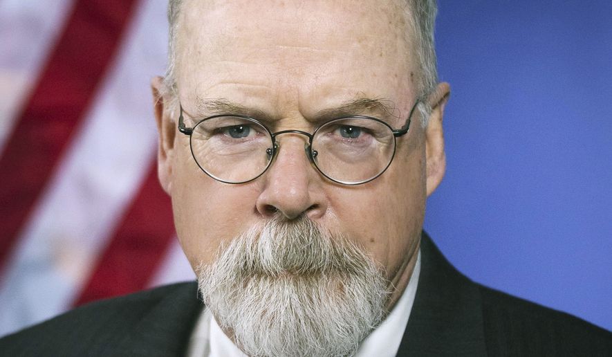 This 2018 portrait released by the U.S. Department of Justice shows Connecticut&#x27;s U.S. Attorney John Durham. A judge says the criminal prosecution of Michael Sussmann, a Hillary Clinton campaign lawyer charged with lying to the FBI during the Trump-Russia investigation, can move forward. The ruling means Sussmann, who was charged last year by special counsel John Durham, remains set for trial on May 16, 2022, in Washington&#x27;s federal court. (Department of Justice via AP) ** FILE **