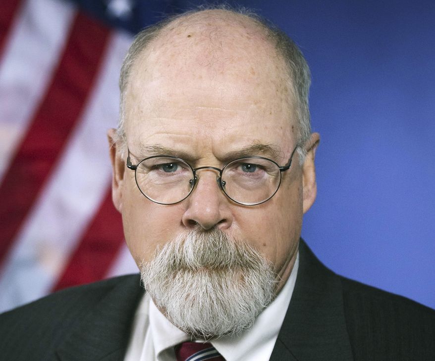 This 2018 portrait released by the U.S. Department of Justice shows Connecticut&#39;s U.S. Attorney John Durham. A judge says the criminal prosecution of Michael Sussmann, a Hillary Clinton campaign lawyer charged with lying to the FBI during the Trump-Russia investigation, can move forward. The ruling means Sussmann, who was charged last year by special counsel John Durham, remains set for trial on May 16, 2022, in Washington&#39;s federal court. (Department of Justice via AP) ** FILE **