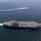This undated photo provided by the U.S. Navy on April 13, 2022, shows USS Abraham Lincoln, front, and other warships sail in formation during a U.S.-Japan bilateral exercise at the Sea of Japan. U.S. and Japanese warships, led by the USS Abraham Lincoln carrier strike group, are conducting their joint naval exercise in waters between Japan and the Korean Peninsula for the first time in five yeas, in a show of their close military alliance amid growing speculation of North Korea&#x27;s missile or nuclear testing later this week. (U.S. Navy via AP)