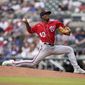 Washington Nationals starting pitcher Josiah Gray (40) works during the first inning of a baseball game against the Atlanta Braves, Wednesday, April 13, 2022, in Atlanta. (AP Photo/Brynn Anderson)