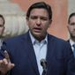 Florida Gov. Ron DeSantis speaks during a news conference, Feb. 1, 2022, in Miami.  DeSantis vetoed the state’s newly draw congressional map and lawmakers will hold a special session in April to redraw the map. DeSantis said Tuesday, March 29,  that lawmakers appear to have focused more on requirements in the state constitution and not the U.S. Constitution. (AP Photo/Rebecca Blackwell)