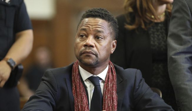 Actor Cuba Gooding Jr. appears in court, Jan. 22, 2020, in New York. Gooding Jr. pleaded guilty Wednesday, April 13, 2022 to one count of forcible touching in a protracted criminal case accusing the Oscar-winning star of violating three different women at various Manhattan night spots in 2018 and 2019. (Alec Tabak/The Daily News via AP, Pool)