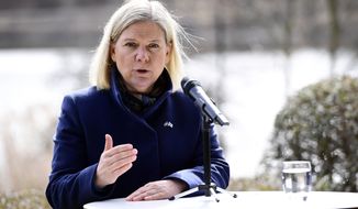Swedish Prime Minister Magdalena Andersson speaks during a press conference with Finnish Prime Minister Sanna Marin ahead of a meeting on whether to seek NATO membership, in Stockholm, Sweden, Wednesday, April 13, 2022. (Paul Wennerholm/TT via AP)