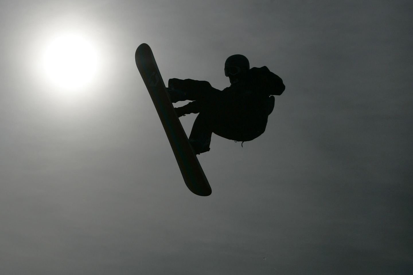 Snowboarding coach, fired over comments on transgender athletes, settles case for $75,000
