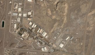 In this satellite photo from Planet Labs PBC, Iran&#39;s Natanz nuclear site is seen March 14, 2022. The United Nations atomic watchdog said Thursday, April 14, 2022, it installed surveillance cameras to monitor a new centrifuge workshop at Iran&#39;s underground Natanz site after a request from Tehran, even as diplomatic efforts to restore its tattered nuclear deal appear stalled. (Planet Labs PBC via AP)