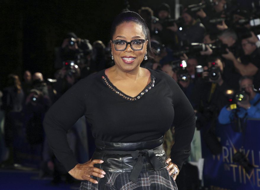 In this March 13, 2018, file photo, actress Oprah Winfrey poses for photographers upon arrival at the premiere of the film &amp;quot;A Wrinkle In Time&amp;quot; in London. (Photo by Joel C Ryan/Invision/AP, File)