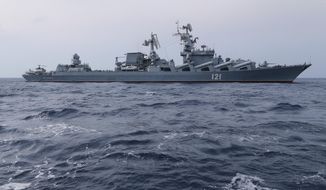 In this photo provided by the Russian Defense Ministry Press Service, Russian navy missile cruiser Moskva is on patrol in the Mediterranean Sea near the Syrian coast on Dec. 17, 2015. The Moskva was sunk in April. (Russian Defense Ministry Press Service via AP, File)