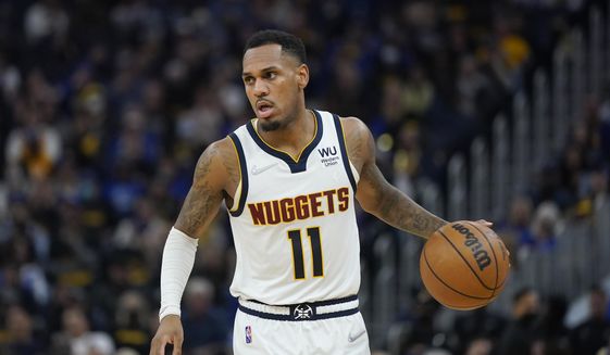 Denver Nuggets guard Monte Morris brings the ball up against the Golden State Warriors during the first half of Game 1 of an NBA basketball first-round playoff series in San Francisco, Saturday, April 16, 2022. (AP Photo/Jeff Chiu) **FILE**