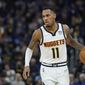 Denver Nuggets guard Monte Morris brings the ball up against the Golden State Warriors during the first half of Game 1 of an NBA basketball first-round playoff series in San Francisco, Saturday, April 16, 2022. (AP Photo/Jeff Chiu) **FILE**